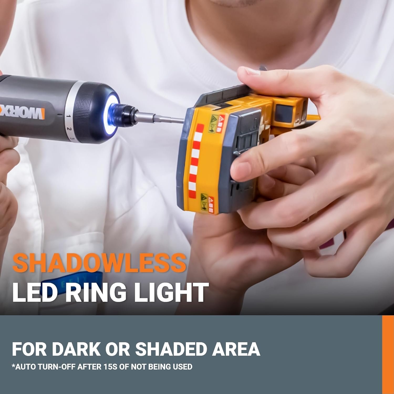 The "Shadowless LED Ring Light" on the front of the WORX screwdriver illuminating a small object in a dark, shaded area.