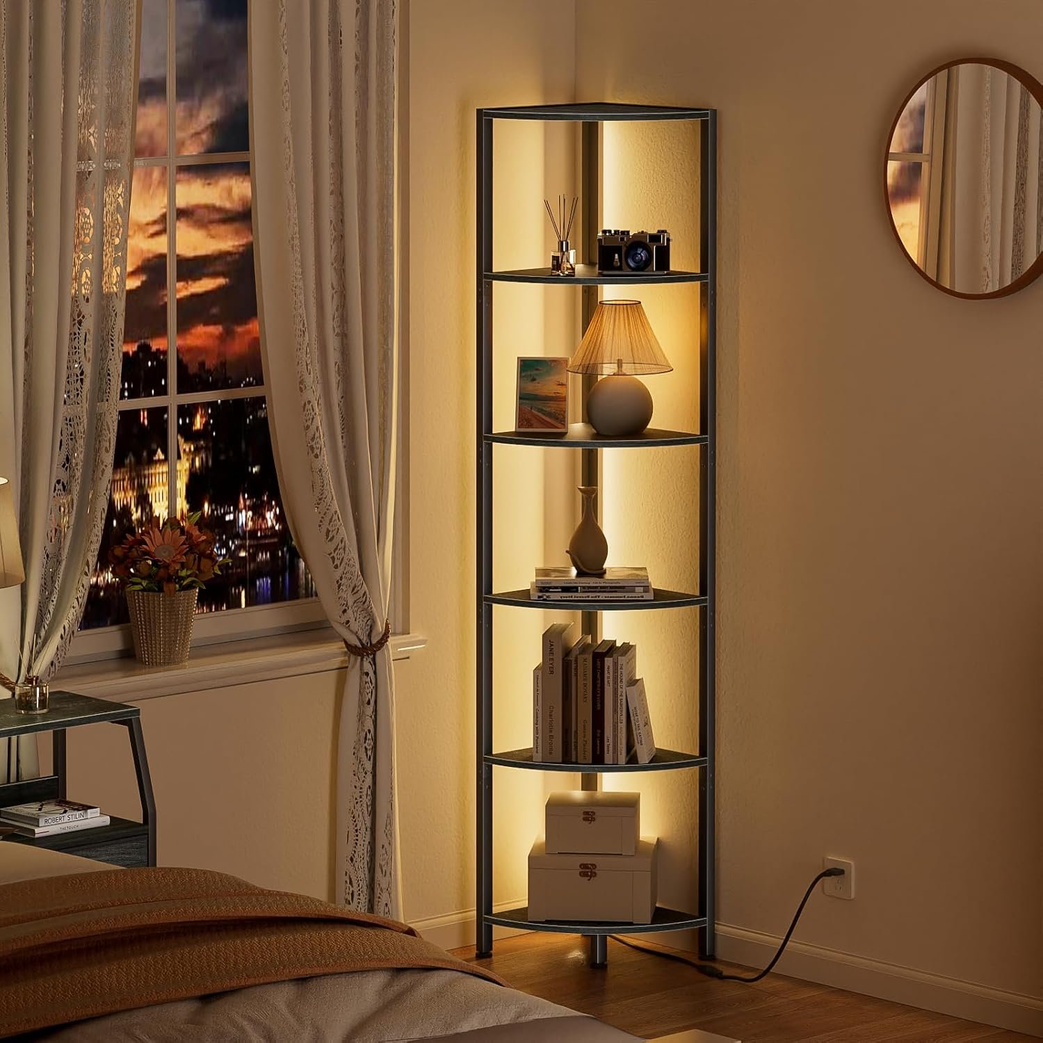 The 6-tier corner shelf placed in a bedroom, illuminated by its warm white LED lights, creating a cozy ambiance next to a bed.