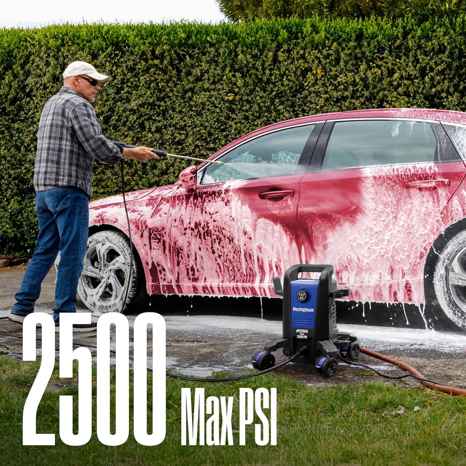 A man using the Westinghouse ePX3500 to wash a red car, which is covered in thick foam from the built-in soap tank. Text says "2500 Max PSI".